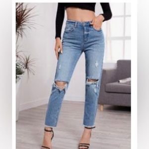 Distressed high rise carrot jeans